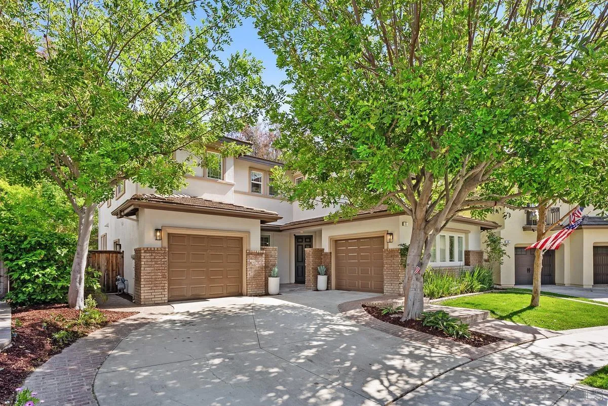 6 Reston Way Ladera Ranch, CA 92694 - Photo 31 of 39 a front view of a house with a garden and trees
