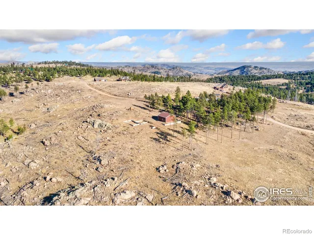 a view of an ocean beach and mountain