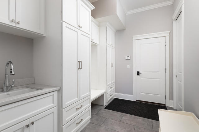 640 Wellner Road Naperville, IL 60540 - Photo 21 of 48 a bathroom with a sink and a mirror