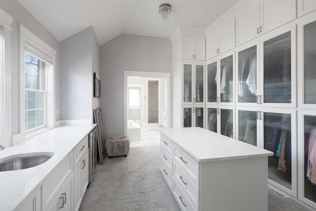 640 Wellner Road Naperville, IL 60540 - Photo 26 of 48 a kitchen that has a sink and a large window