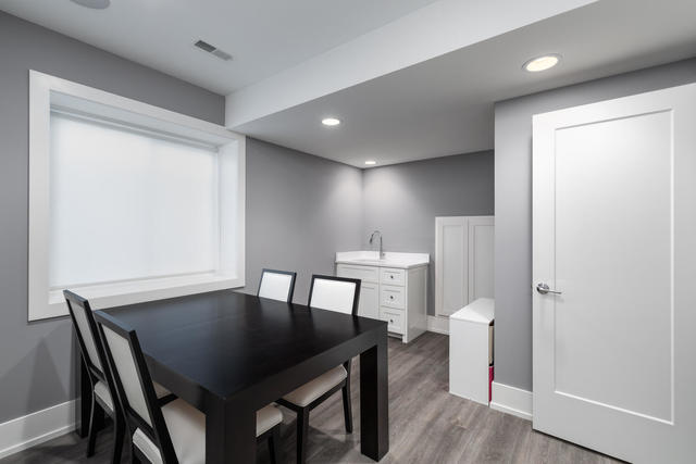 640 Wellner Road Naperville, IL 60540 - Photo 44 of 48 a view of a room with furniture and wooden floor