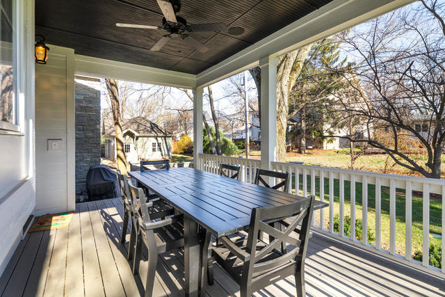 640 Wellner Road Naperville, IL 60540 - Photo 46 of 48 a view of a patio with a table chairs and a backyard