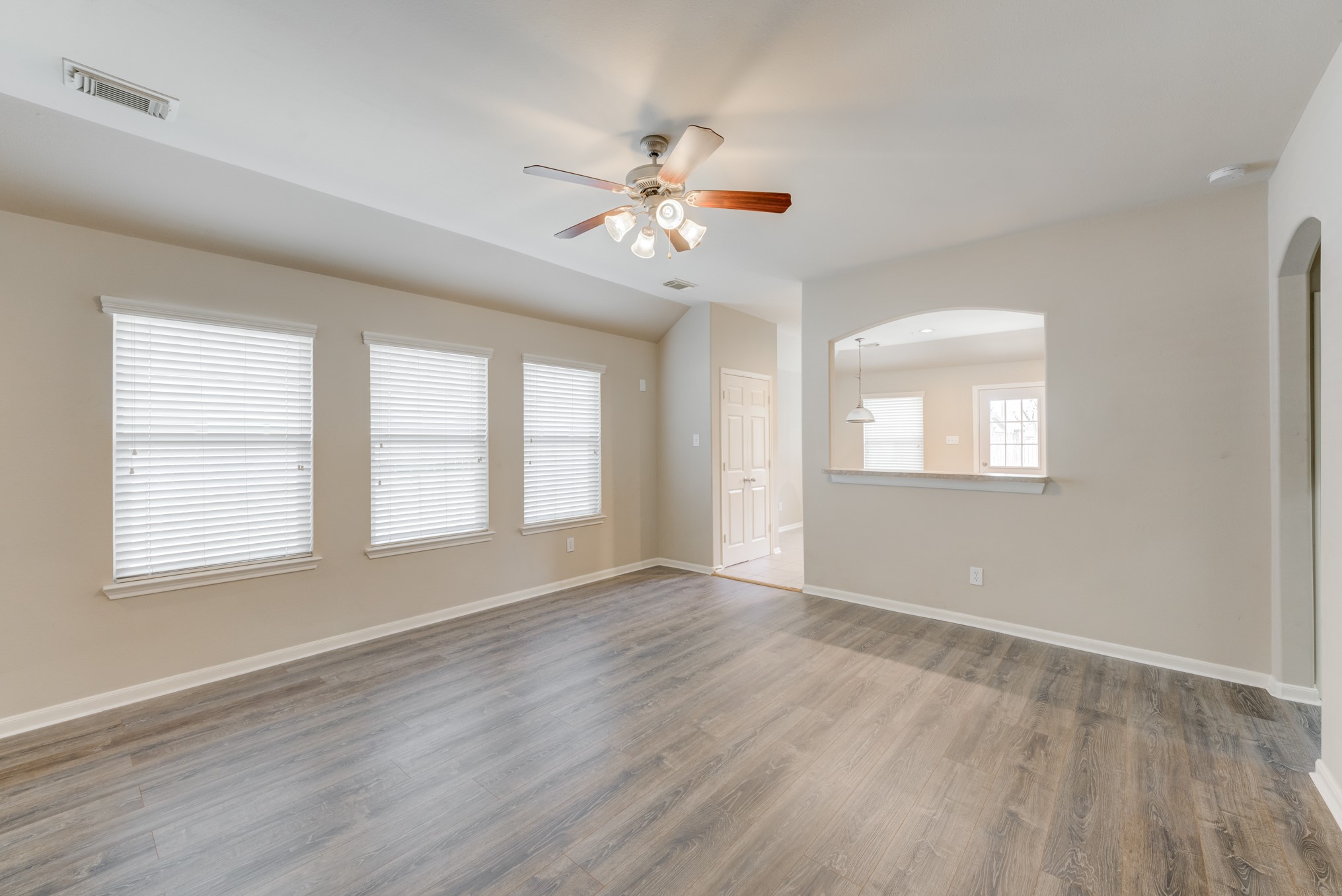 6839 Tammany Manor Lane Spring, TX 77379 - Photo 5 of 25 Views between the living room and kitchen