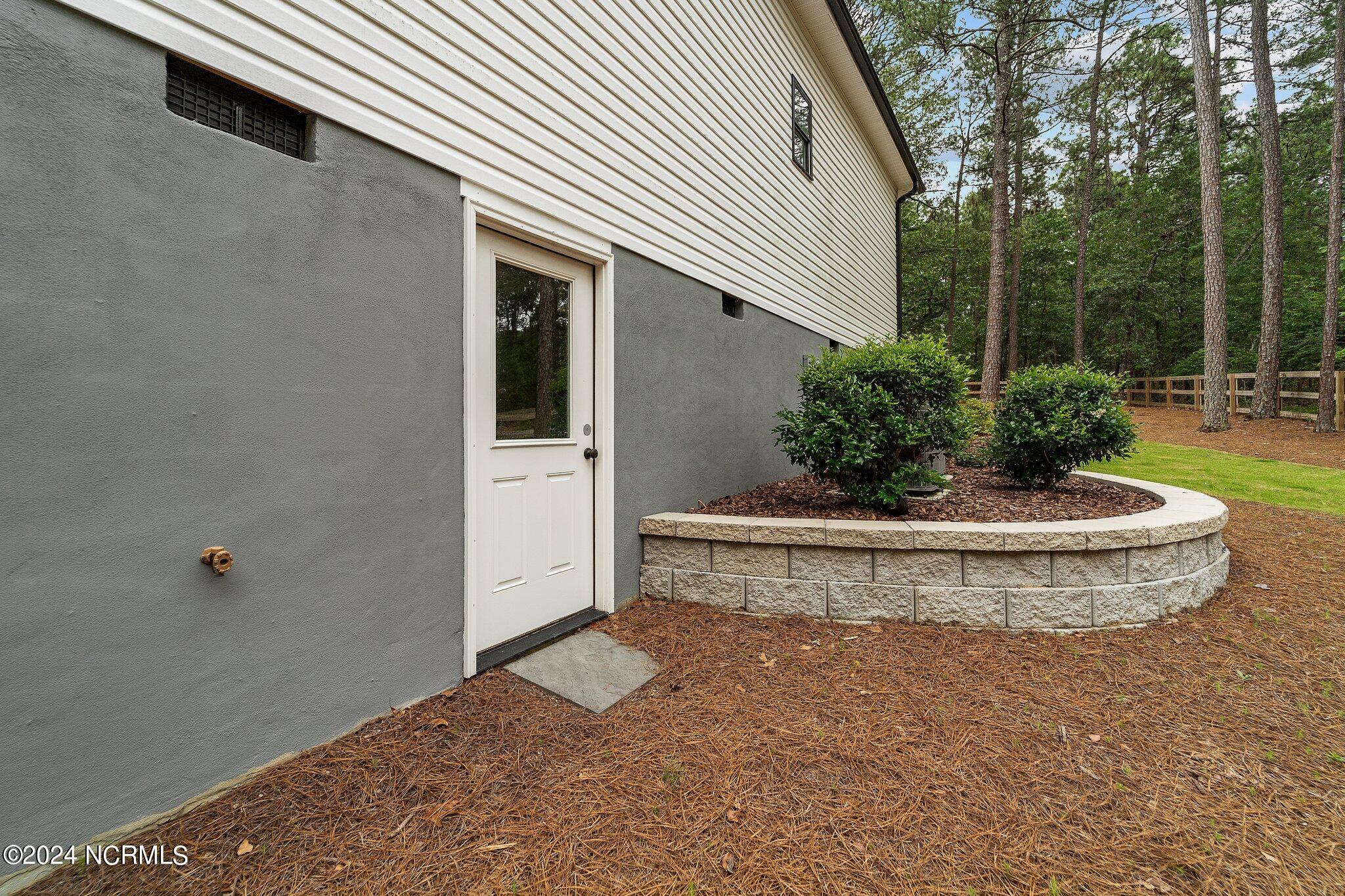 2 Buckhorn Road Jackson Springs, NC 27281 - Photo 53 of 56 Full size door to walk-in crawlspace