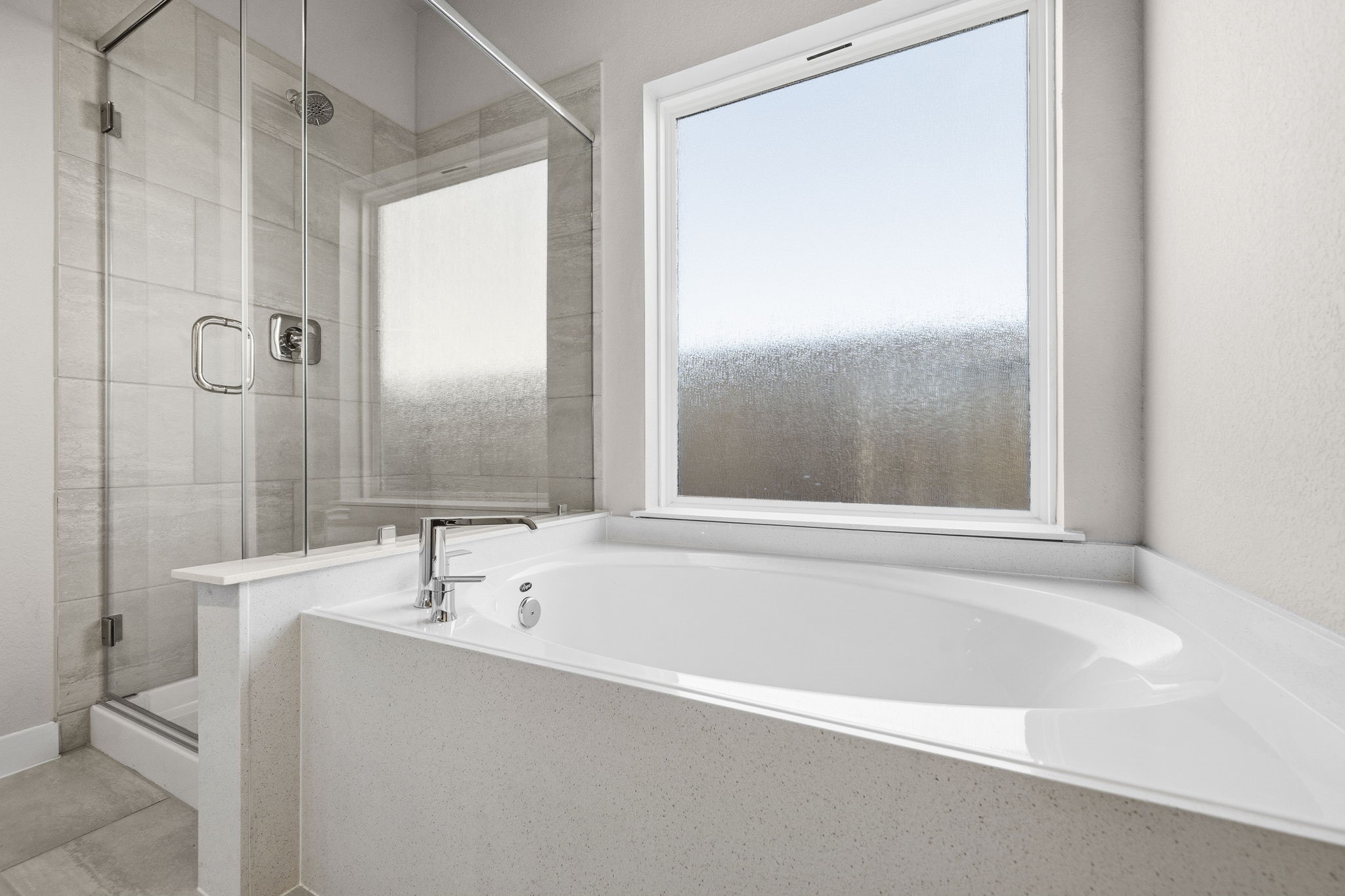 2571 Forest Cedar Lane Conroe, TX 77301 - Photo 20 of 42 a bathroom with a bathtub and a shower