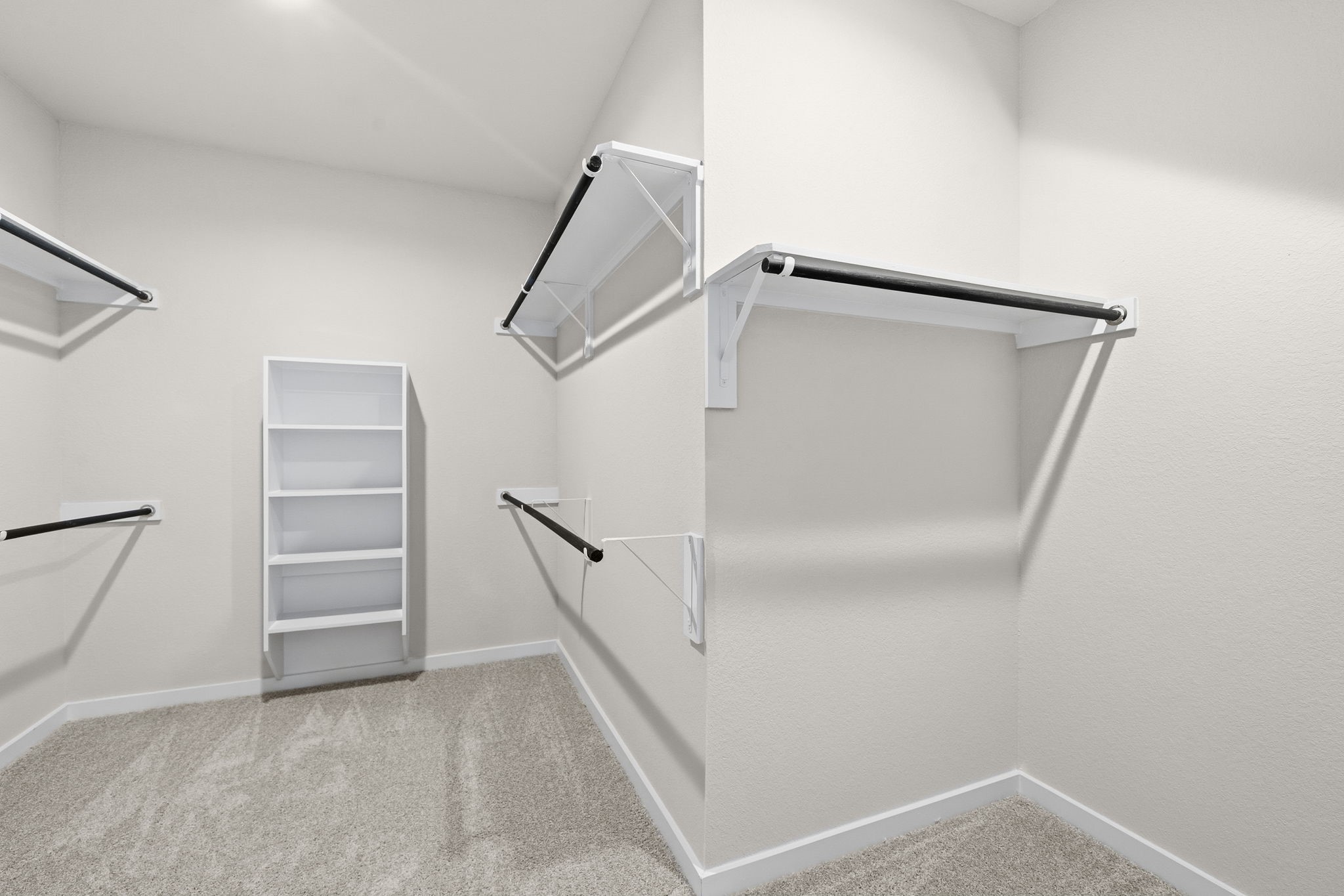 2571 Forest Cedar Lane Conroe, TX 77301 - Photo 21 of 42 a view of walk in closet with empty racks