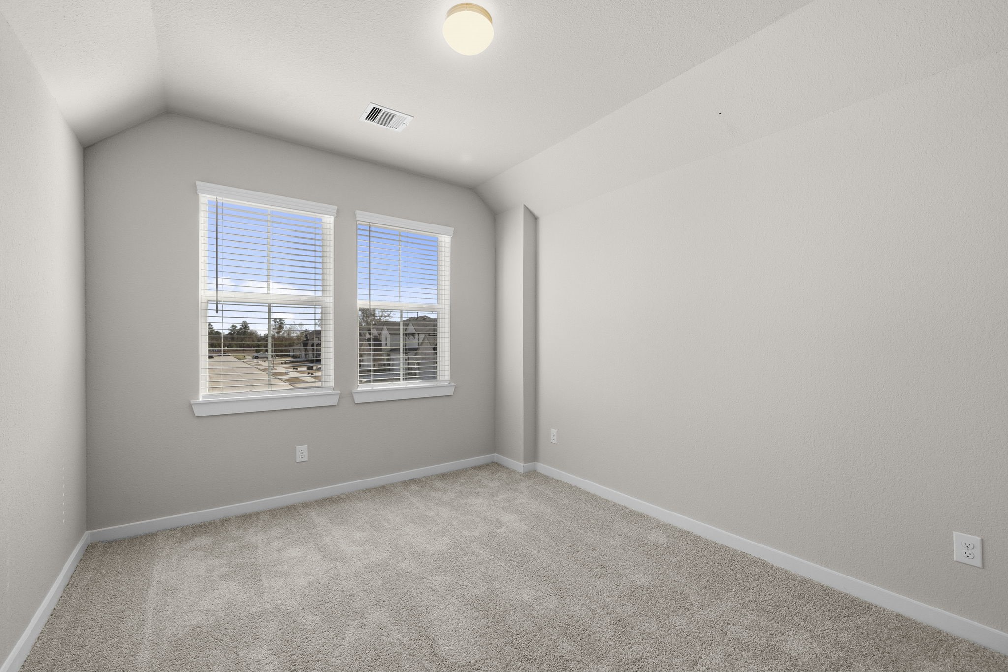 2571 Forest Cedar Lane Conroe, TX 77301 - Photo 27 of 42 an empty room with a window