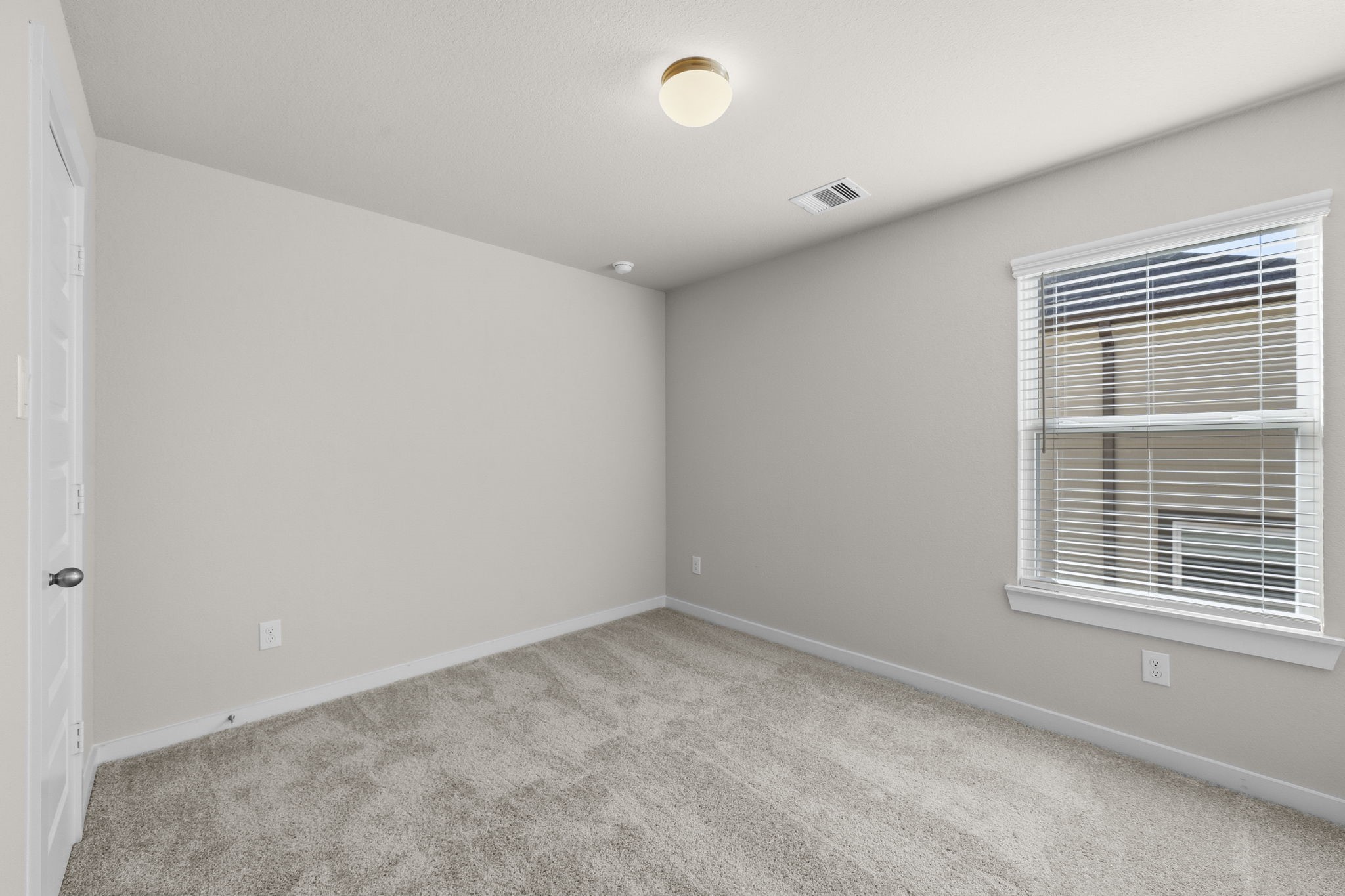 2571 Forest Cedar Lane Conroe, TX 77301 - Photo 30 of 42 a view of an empty room with a window