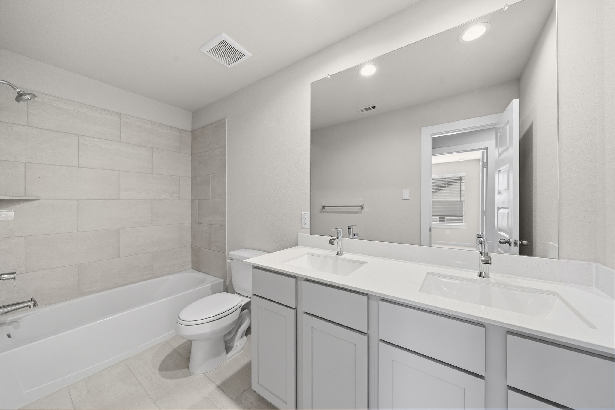 2571 Forest Cedar Lane Conroe, TX 77301 - Photo 32 of 42 a bathroom with a sink a toilet and shower