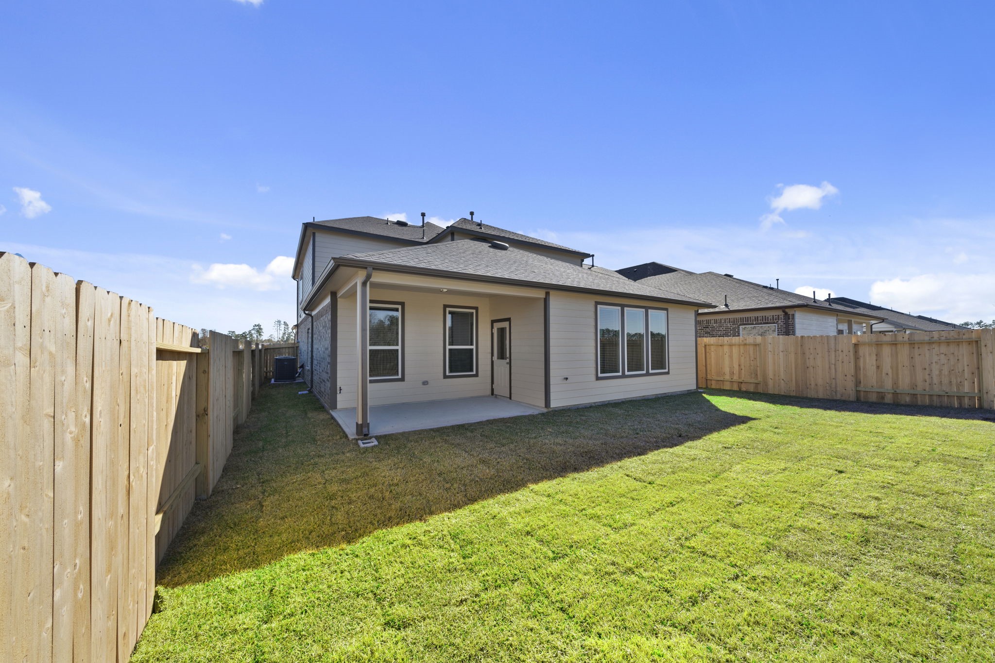 2571 Forest Cedar Lane Conroe, TX 77301 - Photo 37 of 42 a view of a house with a big yard plants and large trees