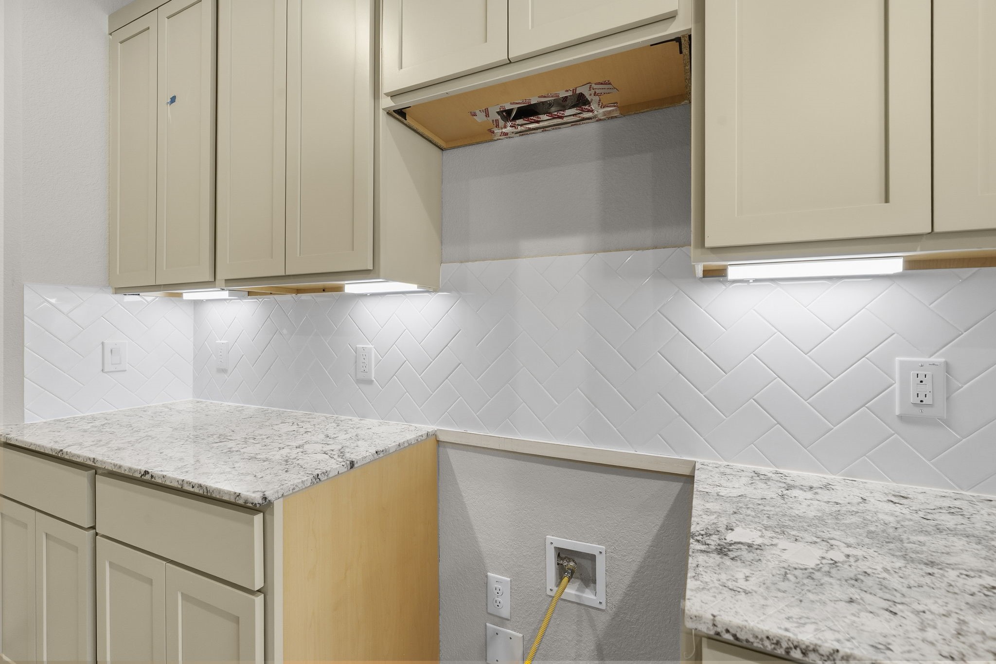 2571 Forest Cedar Lane Conroe, TX 77301 - Photo 4 of 42 a kitchen with a sink and cabinets