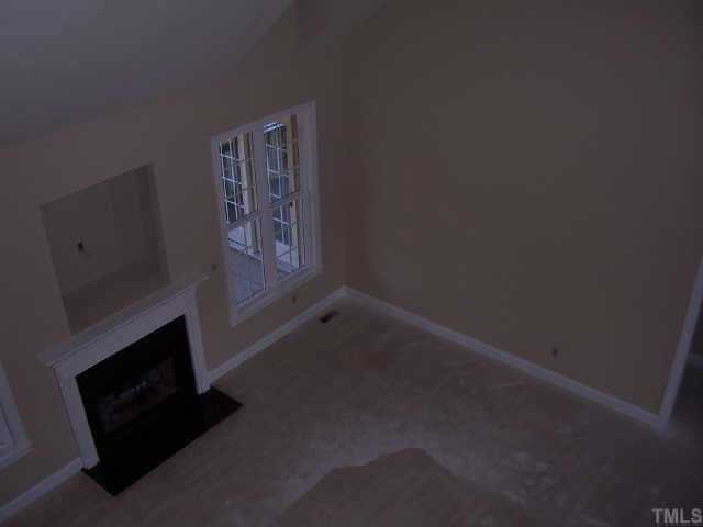 1028 Widgeon Way Raleigh, NC 27603 - Photo 6 of 8 Open cathedral ceiling in family room