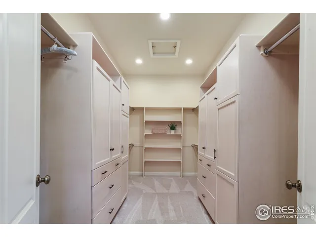 a view of walk in closet with window