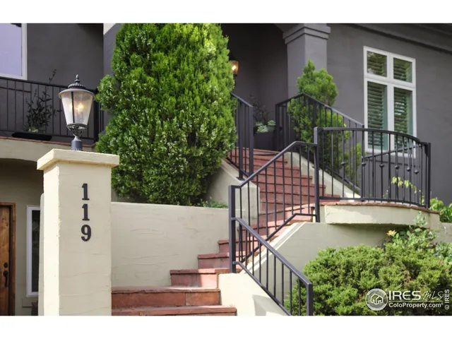 a view of balcony with furniture