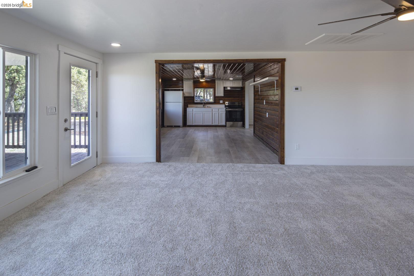 14594 Perricone Road Jamestown, CA 95327 - Photo 11 of 39 a view of empty room with furniture and window