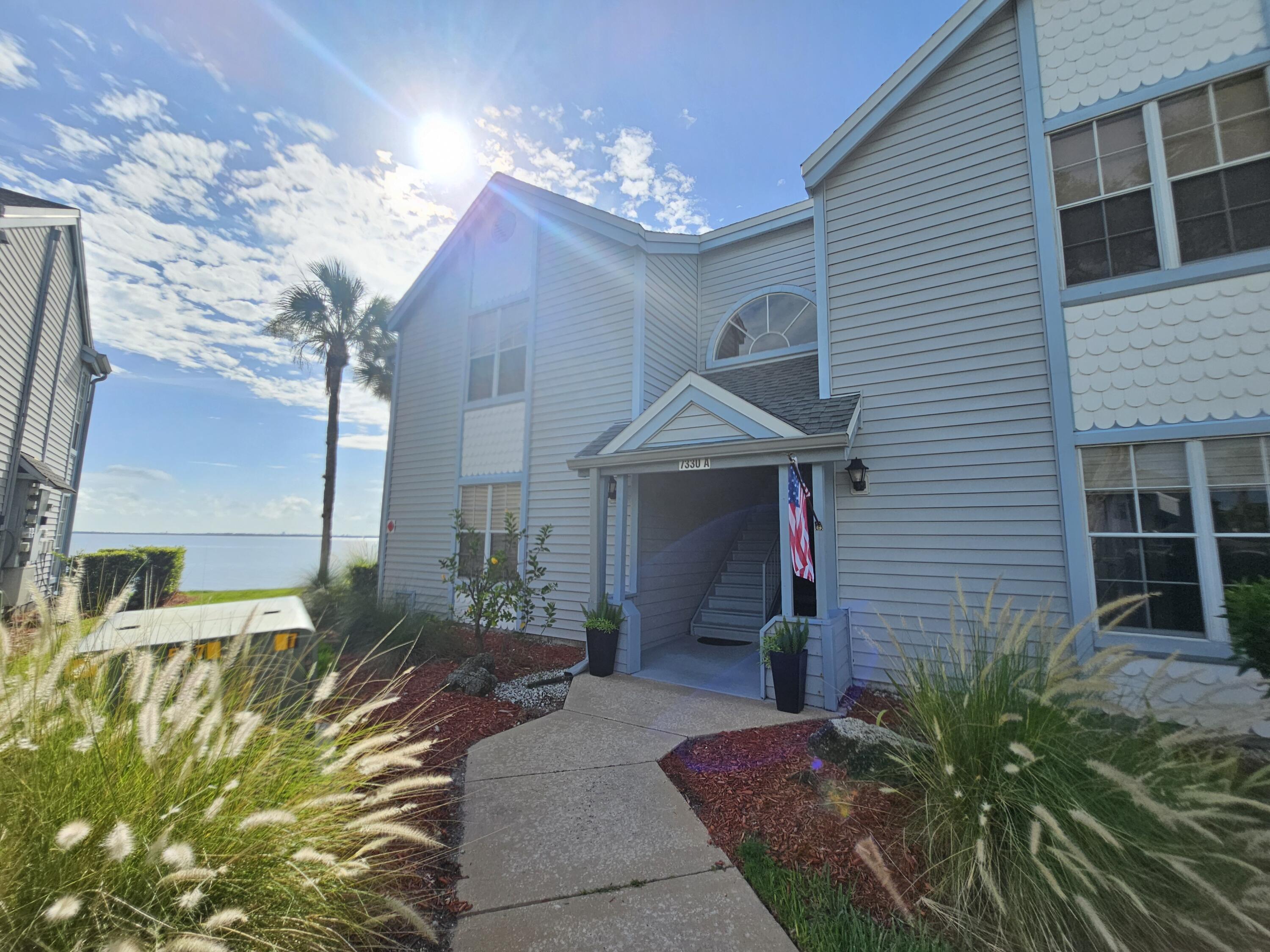 7330 N Highway, Unit 102 Cocoa, FL 32922 - Photo 1 of 26 a front view of a house