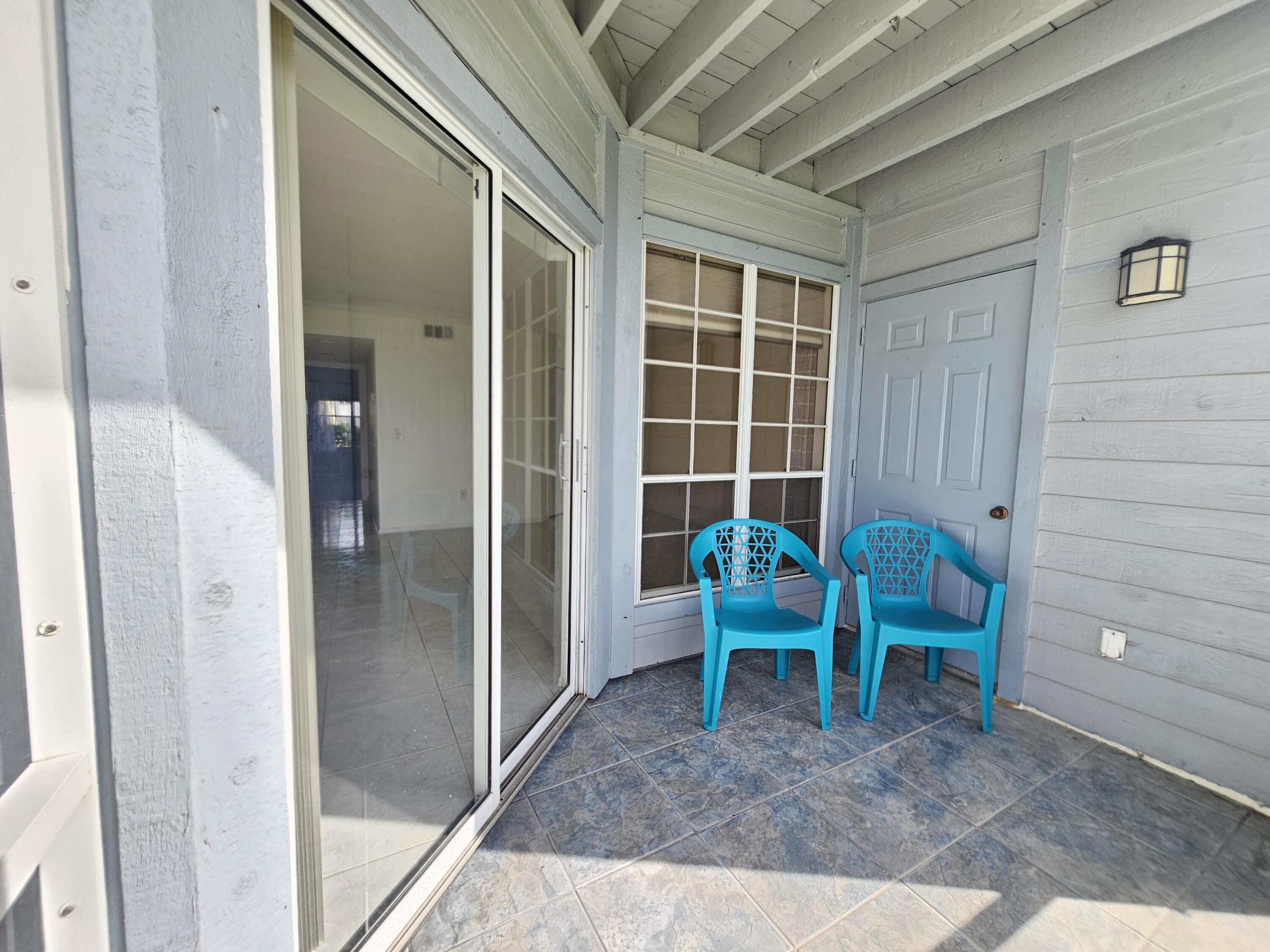 7330 N Highway, Unit 102 Cocoa, FL 32922 - Photo 21 of 26 a view of a room that has a bench in it