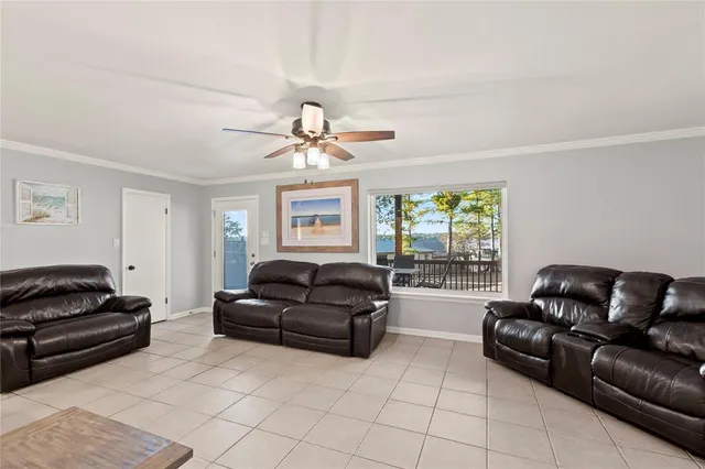 a kitchen with granite countertop a refrigerator and a sink