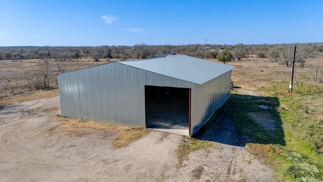a view of a hallway with a large window