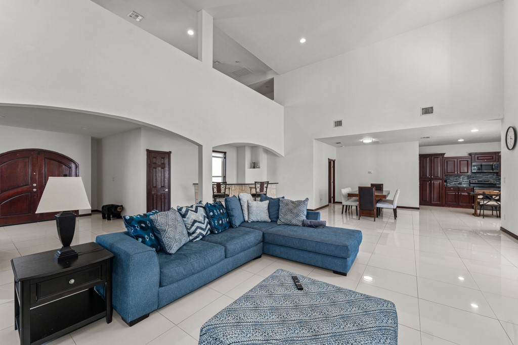 1206 Walter Hoffman Road Cedar Creek, TX 78612 - Photo 19 of 40 a living room with furniture and a lamp