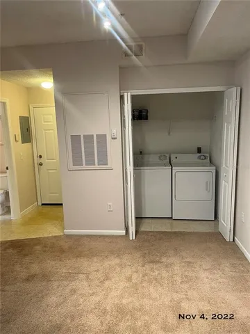 a kitchen with stainless steel appliances a stove a microwave and a refrigerator