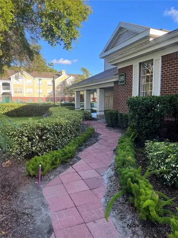 a view of swimming pool with outdoor seating