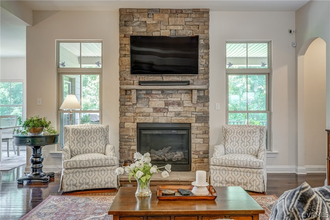 13119 Rodington Court Midlothian, VA 23113 - Photo 14 of 49 a living room with furniture a flat screen tv and a fireplace