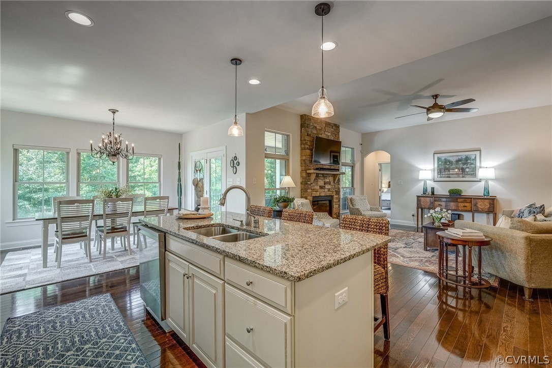 13119 Rodington Court Midlothian, VA 23113 - Photo 16 of 49 a kitchen with center island table and chairs in it