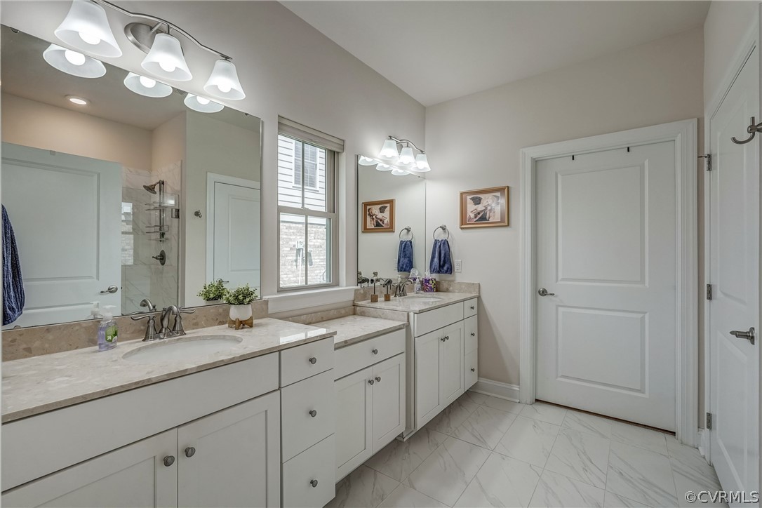 13119 Rodington Court Midlothian, VA 23113 - Photo 29 of 49 a bathroom with double sink and a mirror