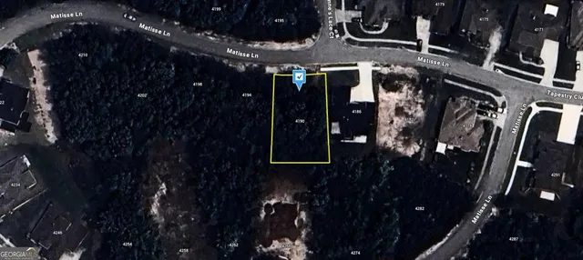 a picture of a tree in front of building