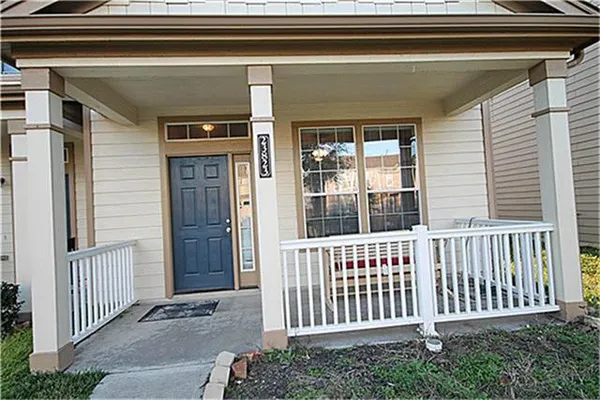 a view of a porch with a swing