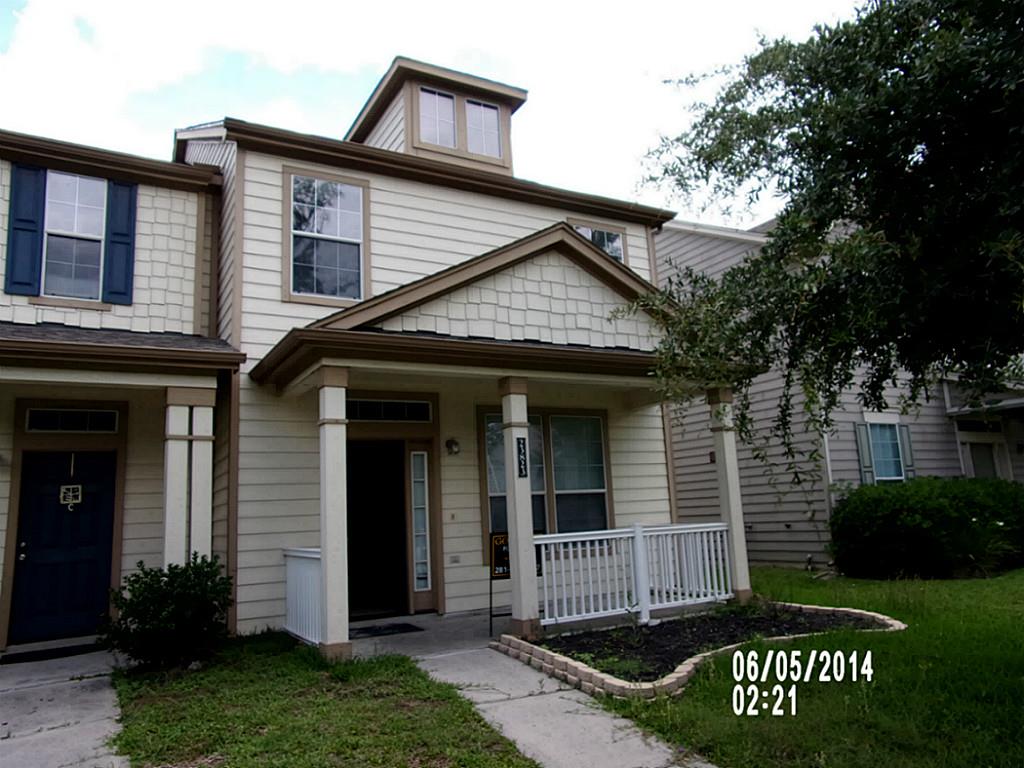 23823 Single Oak Street Spring, TX 77373 - Photo 9 of 10 a front view of a house with garden