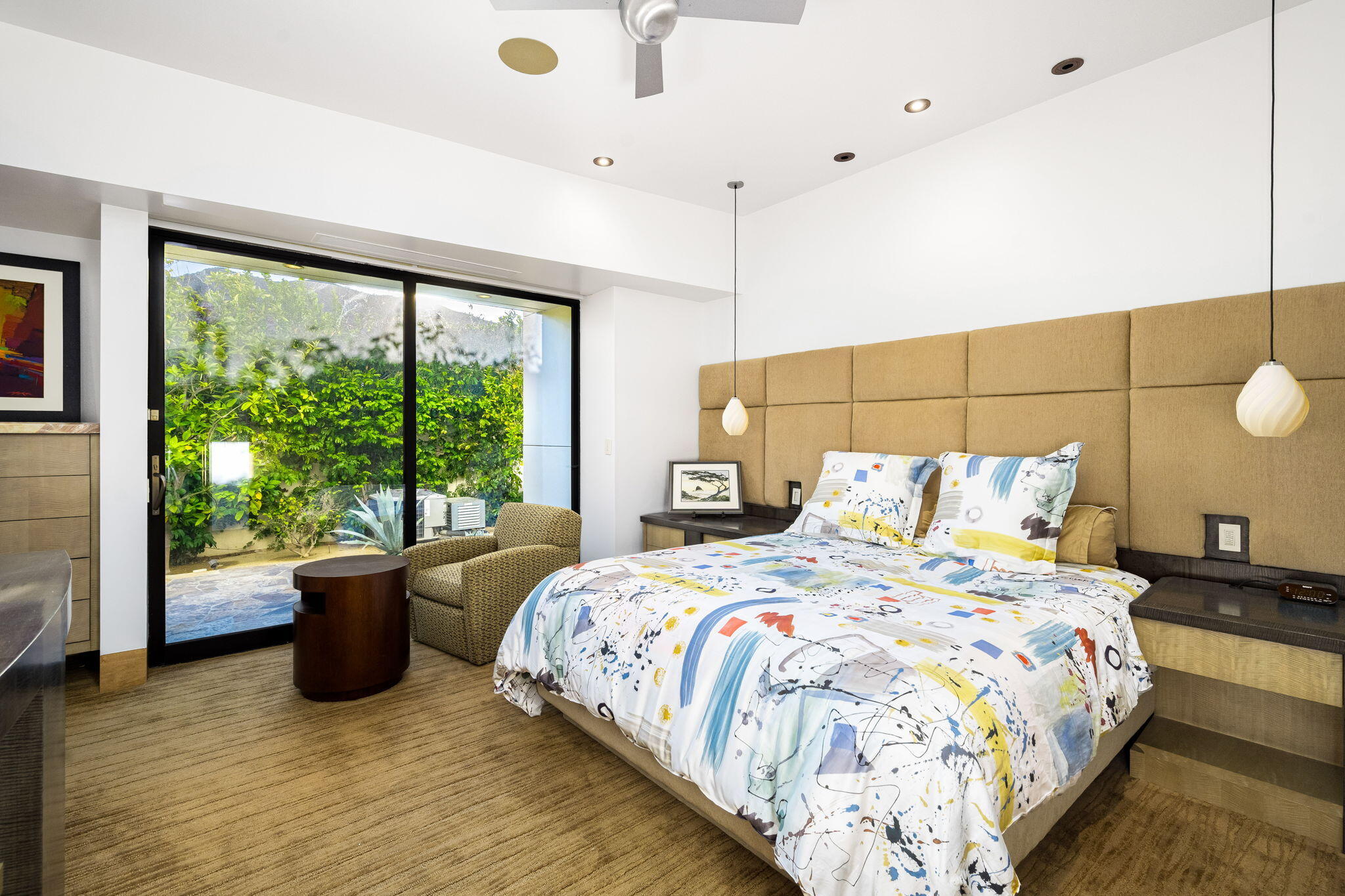 55 Granite Ridge Road Rancho Mirage, CA 92270 - Photo 19 of 34 a bedroom with a bed and a large window