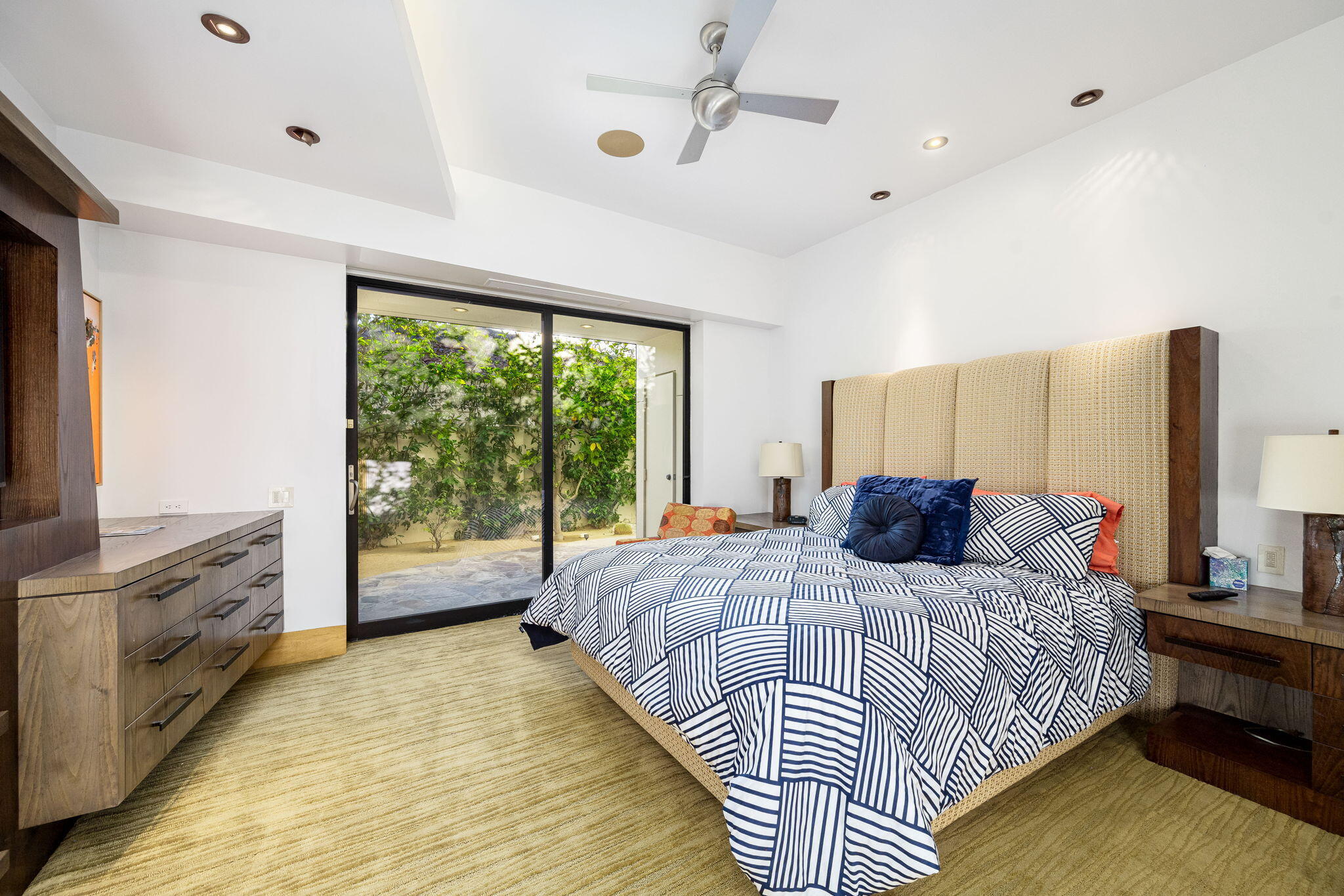 55 Granite Ridge Road Rancho Mirage, CA 92270 - Photo 20 of 34 a bedroom with a bed and window