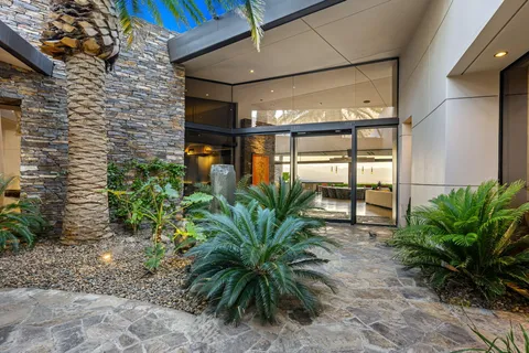 a view of a potted plants in front of a building