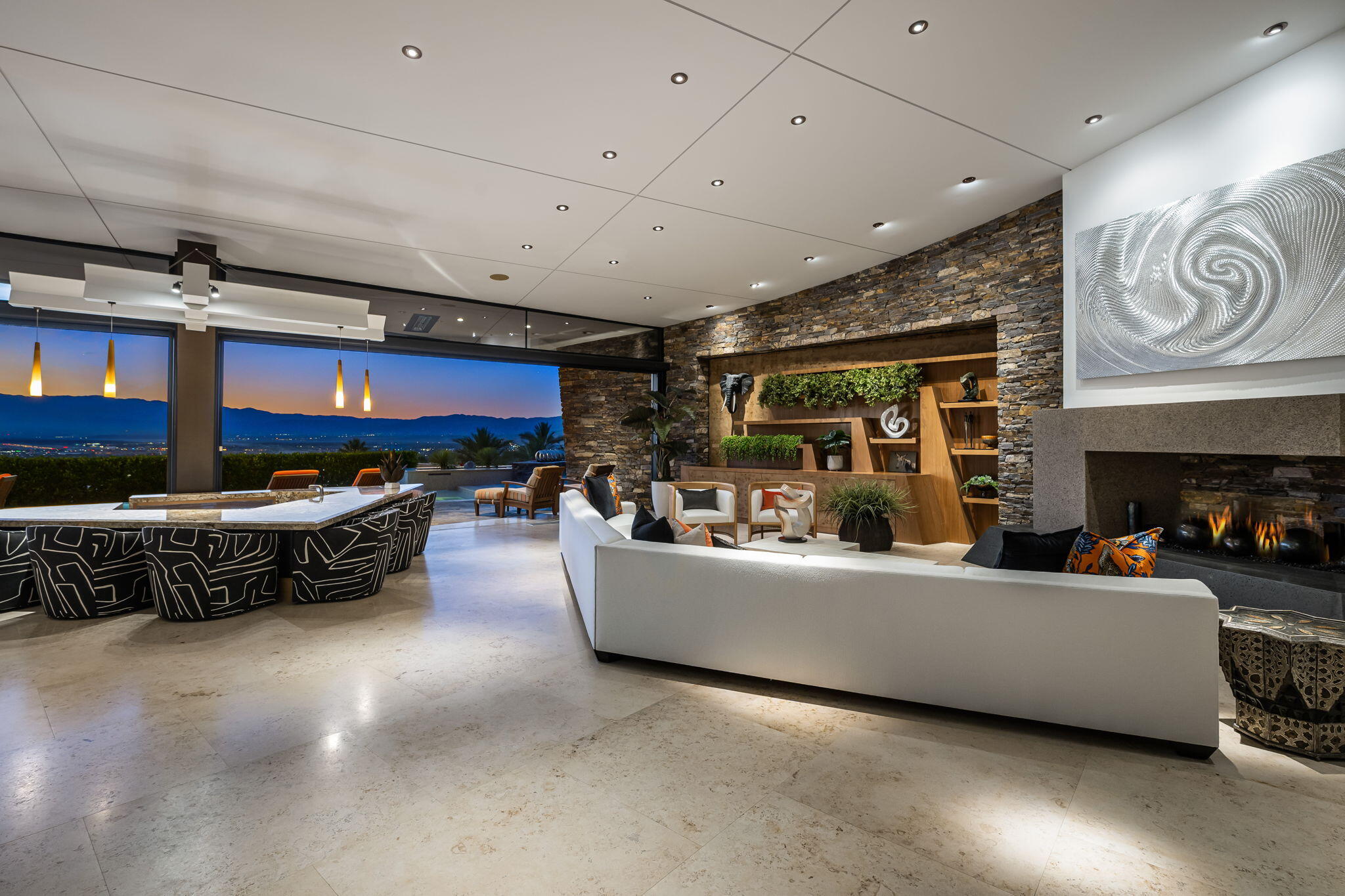 55 Granite Ridge Road Rancho Mirage, CA 92270 - Photo 33 of 34 a living room with furniture and a fireplace