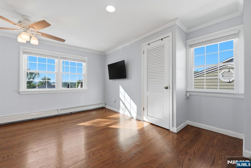 44 Alpine Place Kearny, NJ 07032 - Photo 31 of 50 a view of a livingroom with wooden floor and a window