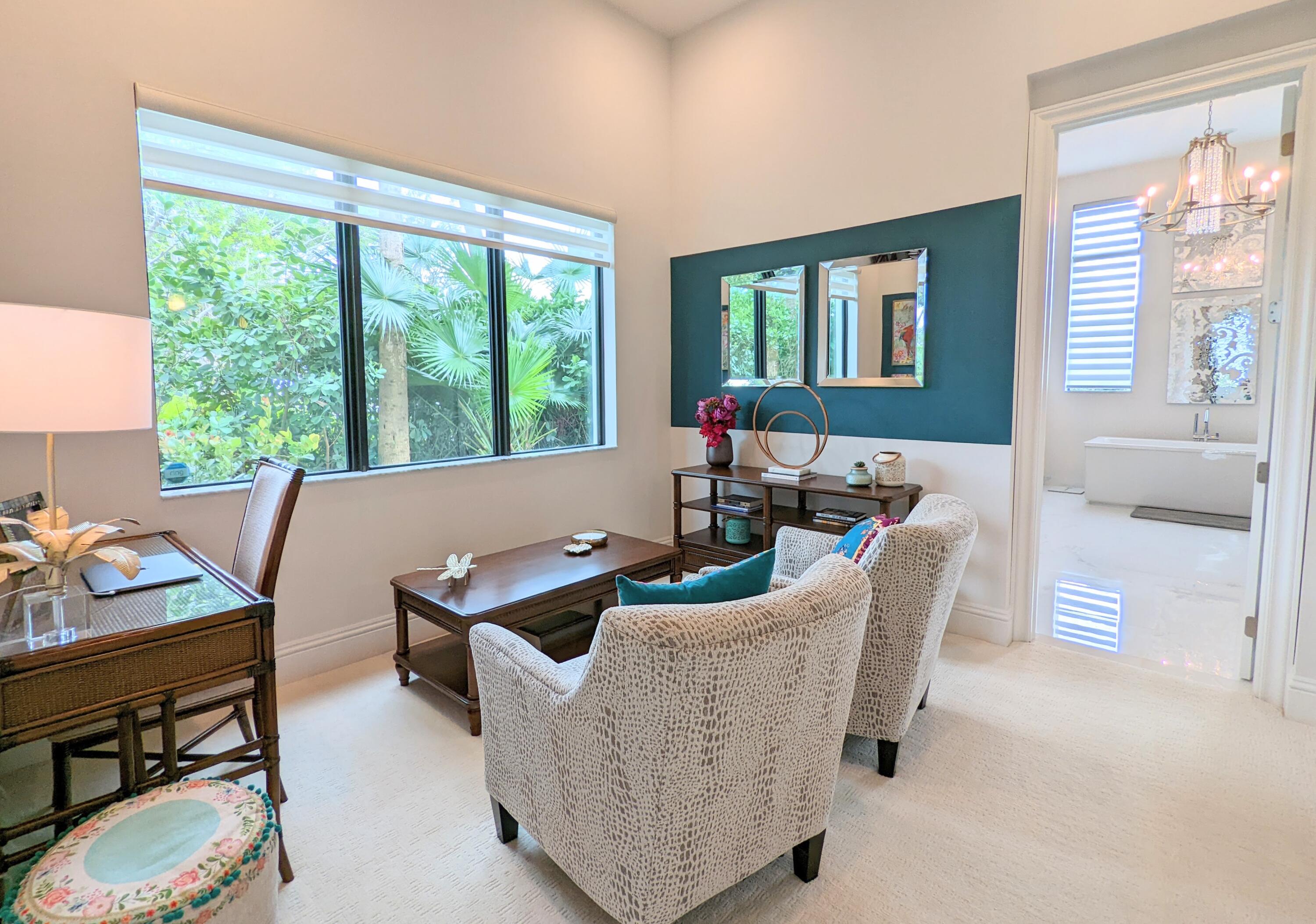 7095 Northwest 27th Avenue Boca Raton, FL 33496 - Photo 20 of 51 a living room with furniture and a floor to ceiling window
