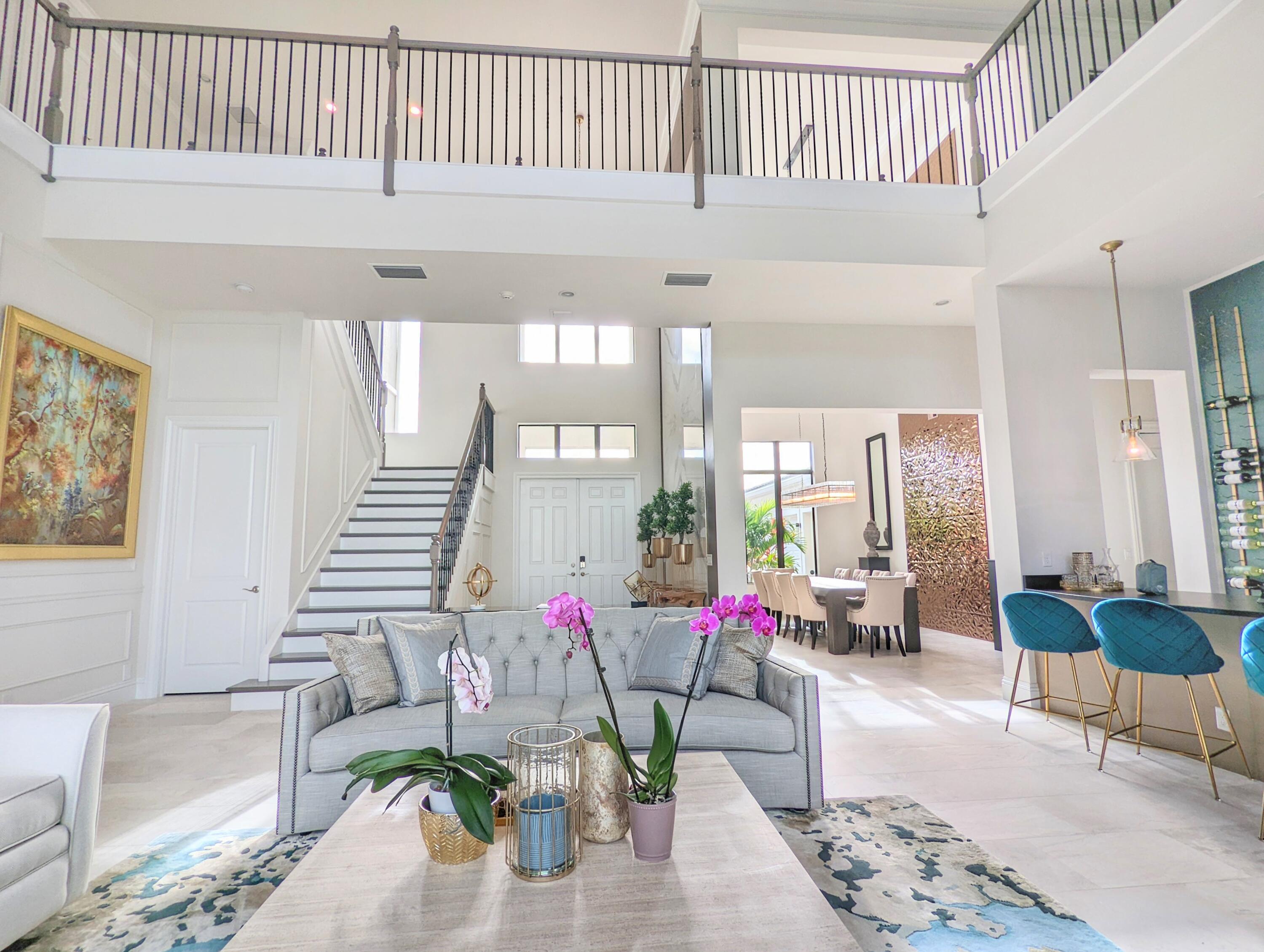 7095 Northwest 27th Avenue Boca Raton, FL 33496 - Photo 3 of 51 a living room with furniture and wooden floor