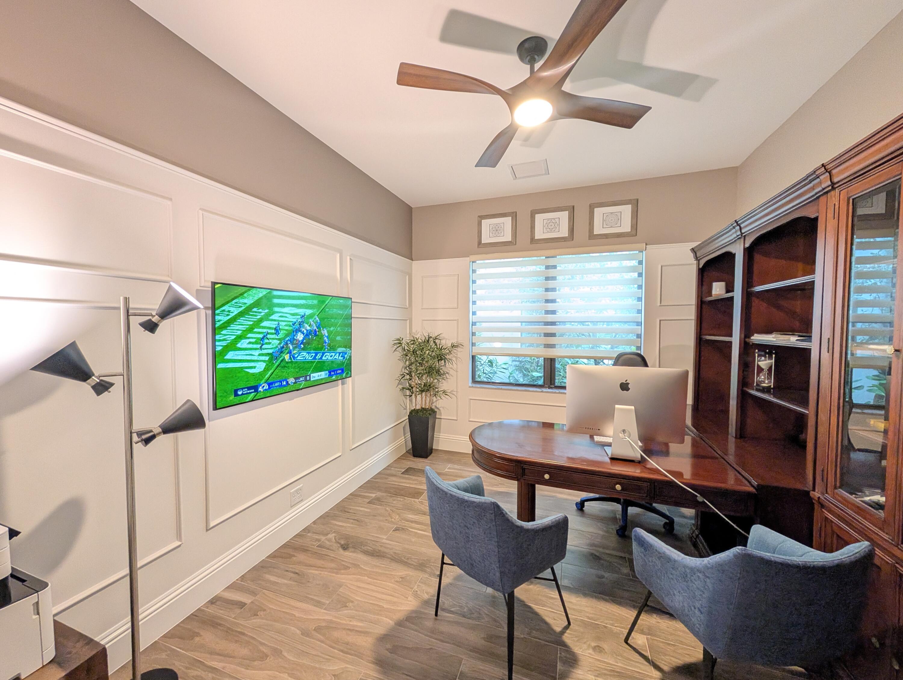 7095 Northwest 27th Avenue Boca Raton, FL 33496 - Photo 34 of 51 a work room with furniture and a large window