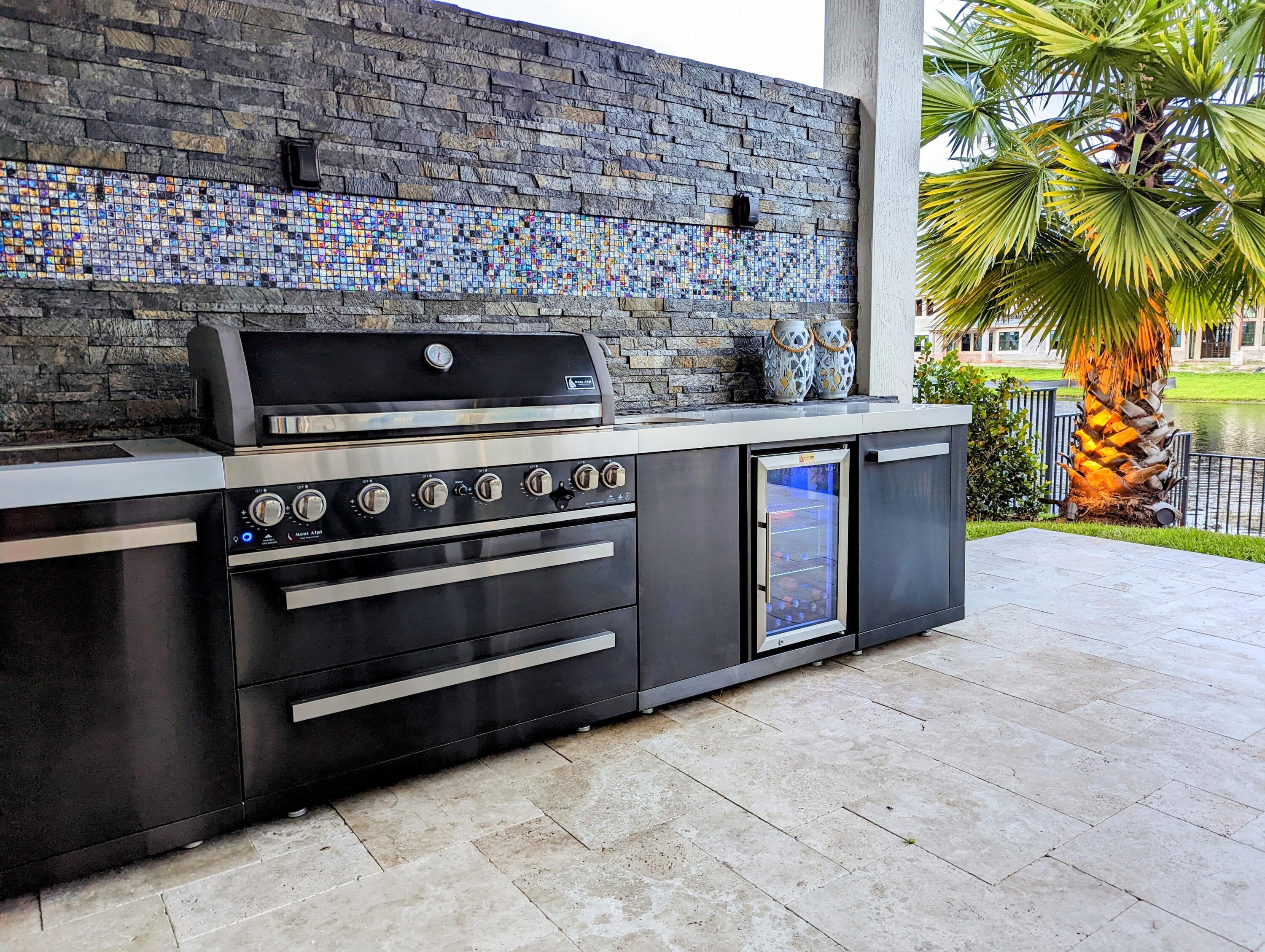 7095 Northwest 27th Avenue Boca Raton, FL 33496 - Photo 39 of 51 a view of outdoor kitchen with stainless steel appliances