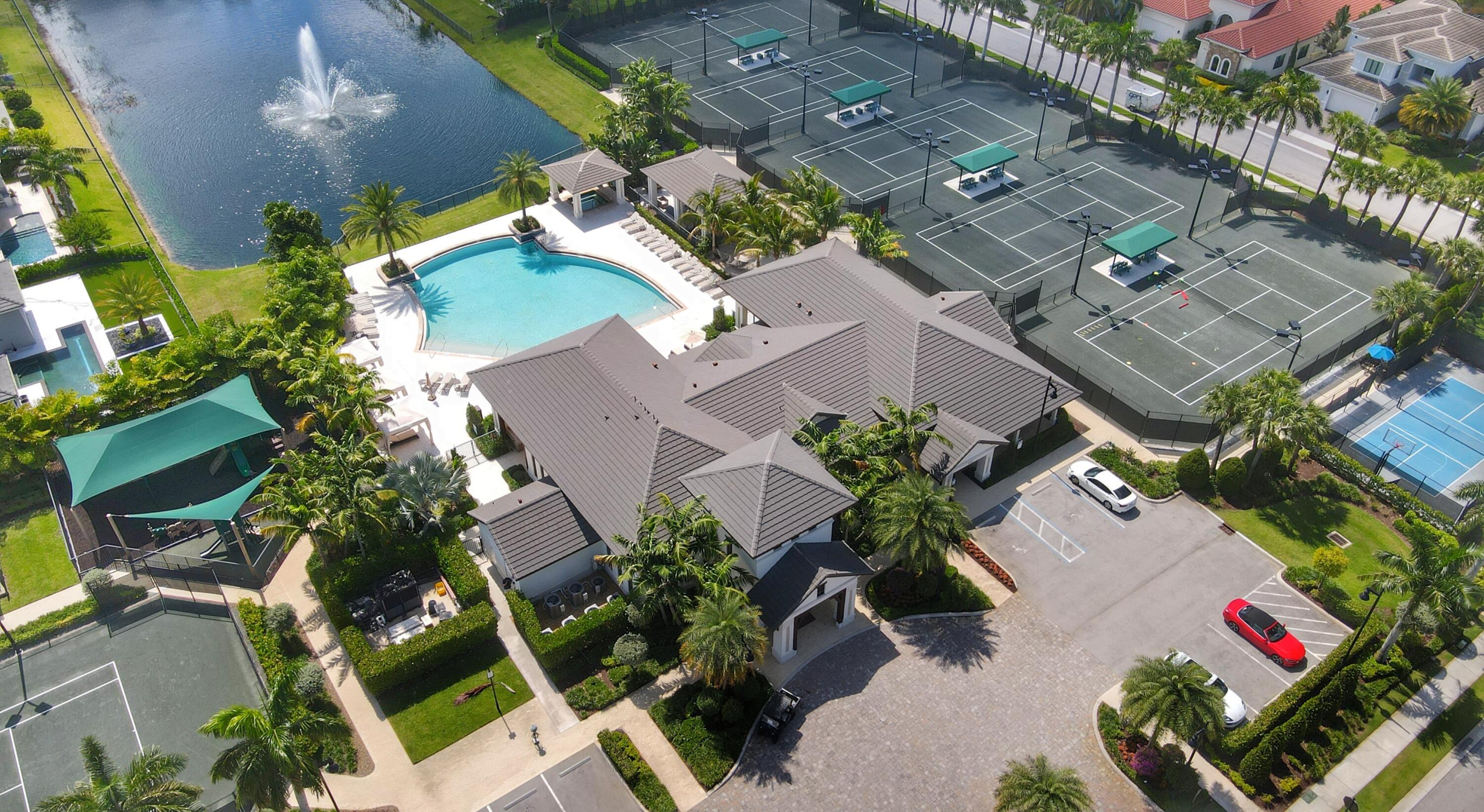 7095 Northwest 27th Avenue Boca Raton, FL 33496 - Photo 48 of 51 an aerial view of residential house with outdoor space and swimming pool