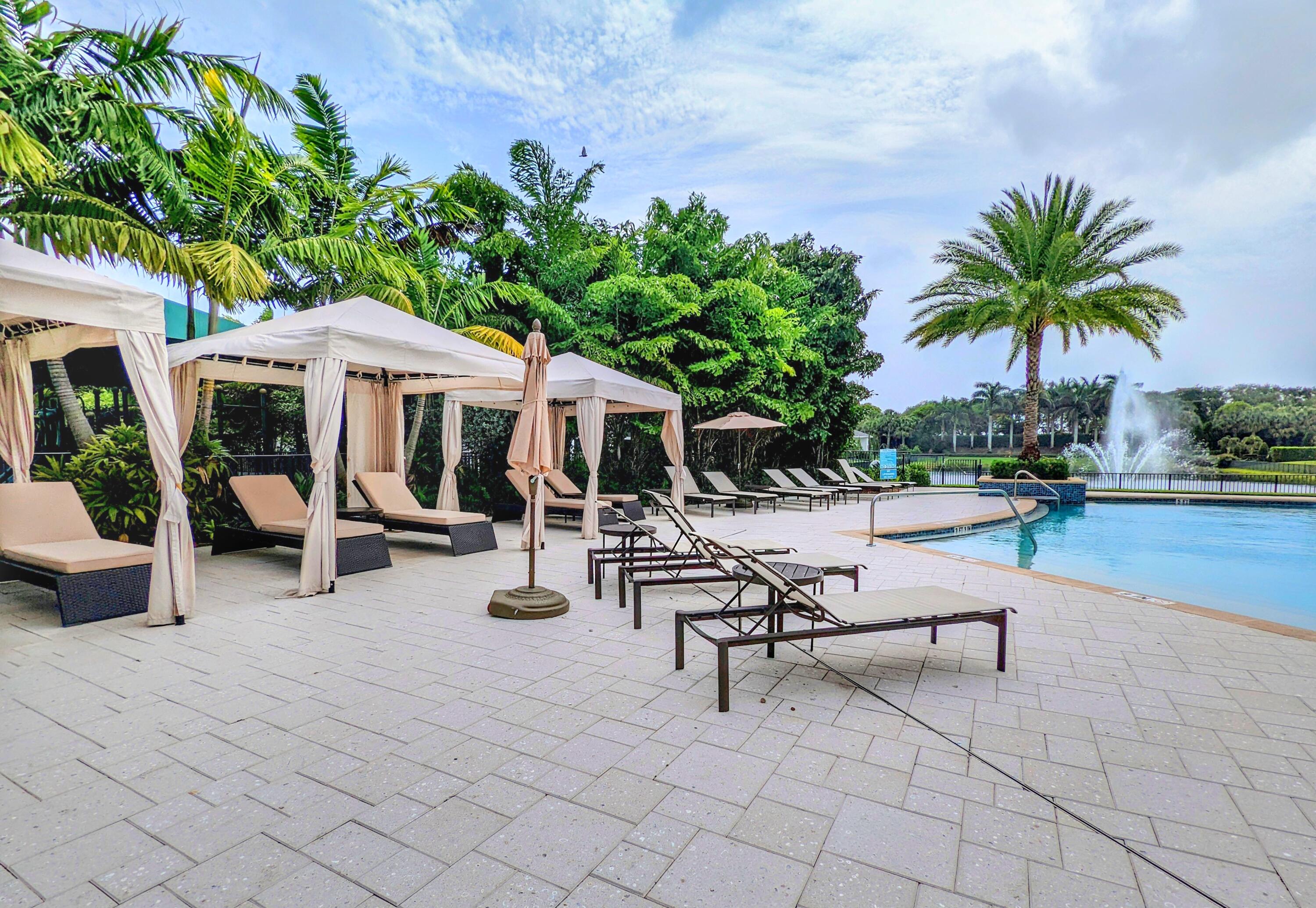 7095 Northwest 27th Avenue Boca Raton, FL 33496 - Photo 50 of 51 a view of a backyard with a sitting area and furniture