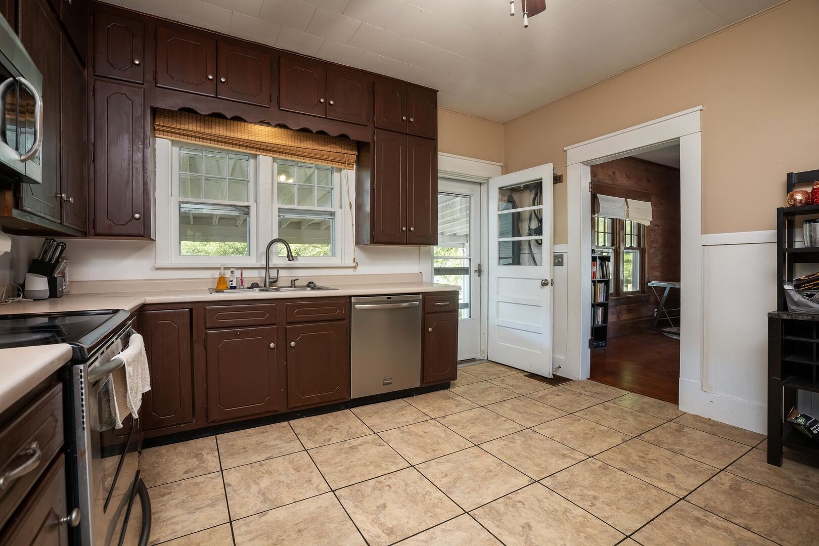 505 California Street Carterville, IL 62918 - Photo 16 of 23 a kitchen with a sink stove and cabinets