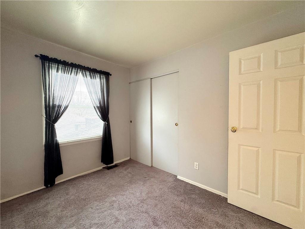 111 Mt Pleasant Boulevard Irwin, PA 15642 - Photo 20 of 27 wooden floor in an empty room with a window