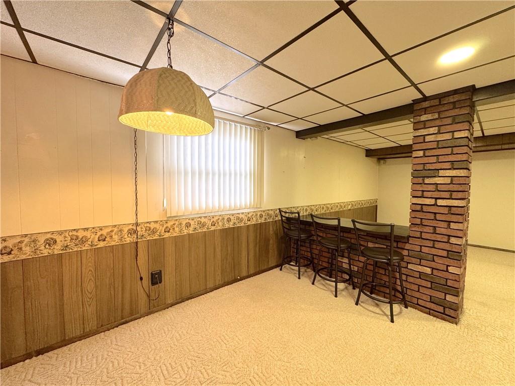 111 Mt Pleasant Boulevard Irwin, PA 15642 - Photo 27 of 27 a room with a table and window