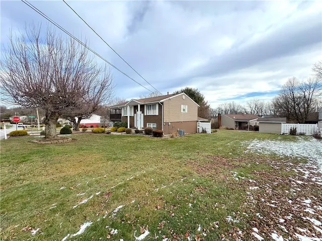 a front view of house with yard