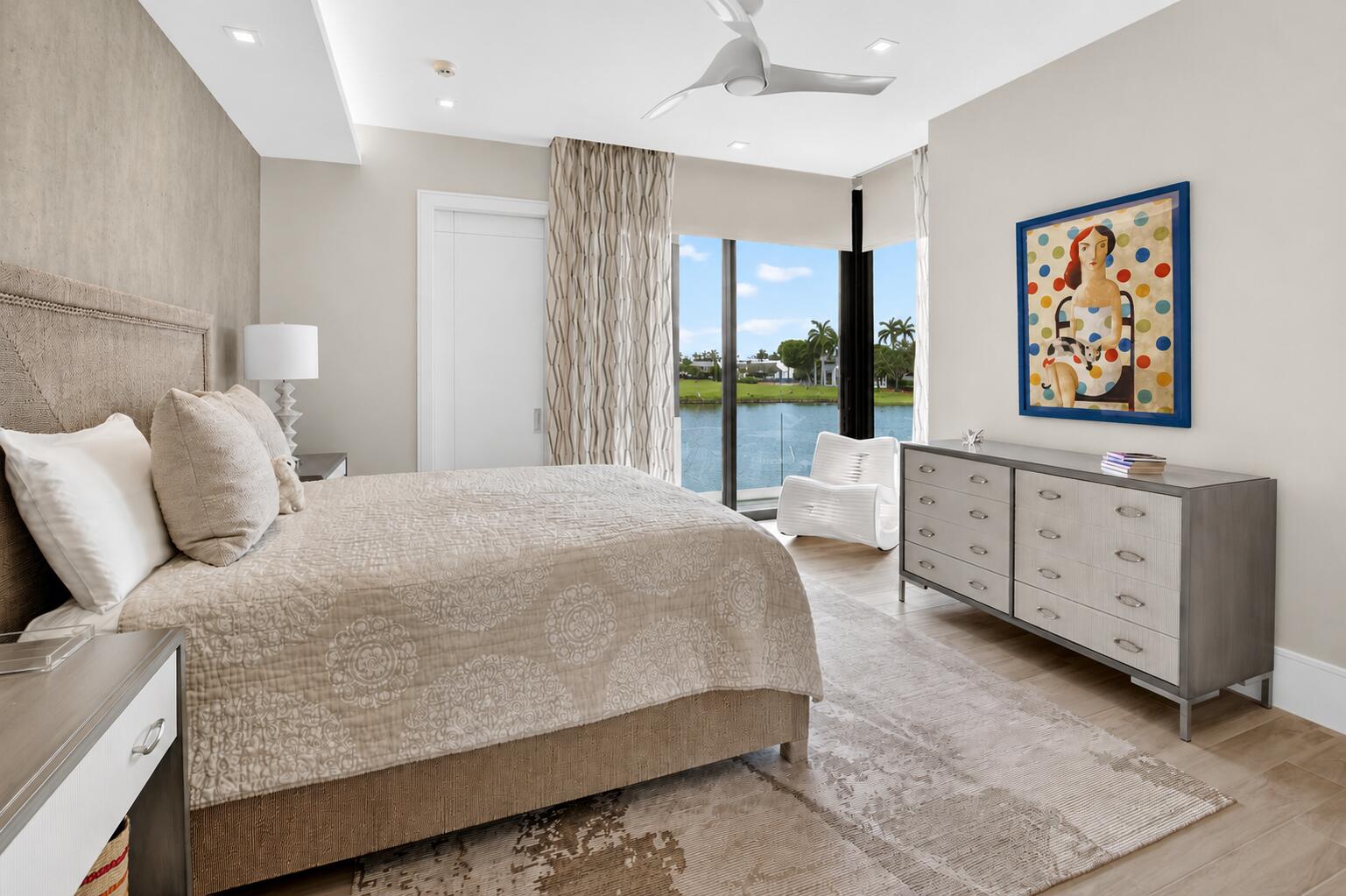 6960 Lake Estates Court Boca Raton, FL 33496 - Photo 33 of 58 a bed room with a bed window and mirror