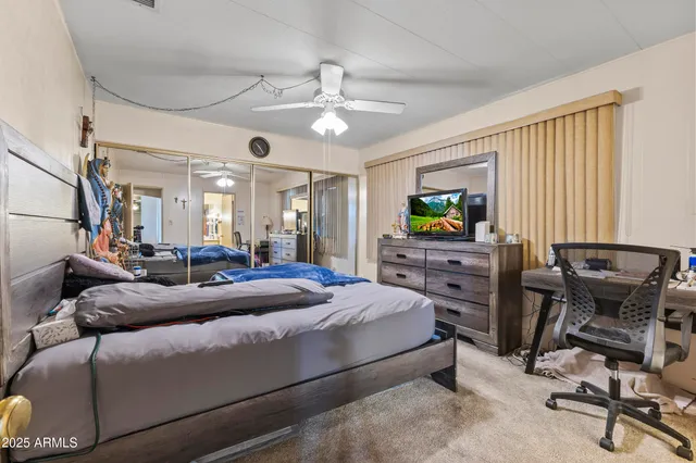 a bathroom with a sink vanity and a mirror