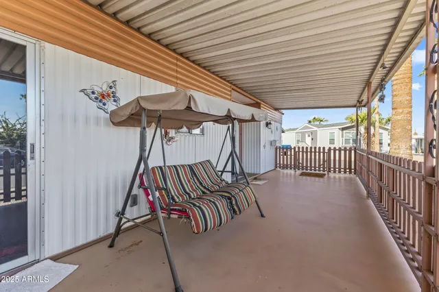 a view of a porch with furniture